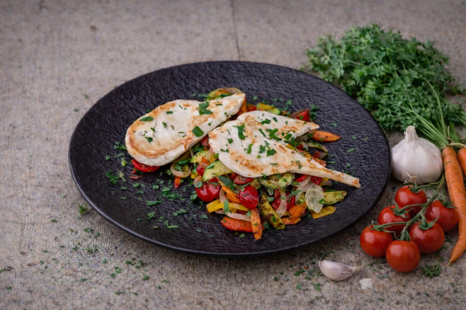 Pan-fried chicken breast with sautéed vegetables